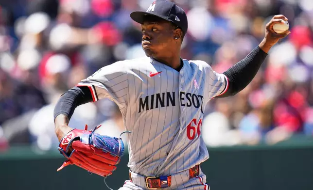Minnesota Twins' Kendry Rojas pitches in the second inning of a baseball game against the Cleveland Guardians in Cleveland, Sunday, May 10, 2026. (AP Photo/Sue Ogrocki)
