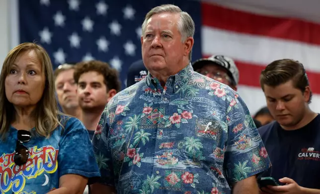 Rep. Ken Calvert, R-Calif., listens to Leticia Castillo, member of the California State Assembly, speak at a "Barbeque, Beer and Ballots" event organized by Reform California on Saturday, May 9, 2026, in Corona, Calif. (AP Photo/Caroline Brehman)