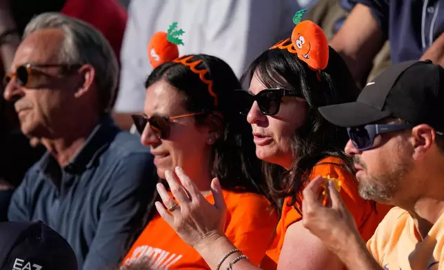 Fans of Jannik Sinner, of Italy, watch his final match against Casper Ruud, of Norway, at the Italian Open tennis tournament, in Rome, Sunday, May 17, 2026. (AP Photo/Alessandra Tarantino)
