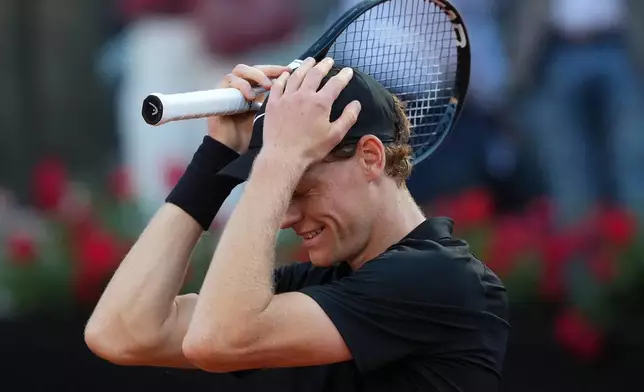 Jannik Sinner, of Italy, reacts after defeating Casper Ruud, of Norway, 6/4, 6/4 in the final match at the Italian Open tennis tournament, in Rome, Sunday, May 17, 2026. (AP Photo/Andrew Medichini)