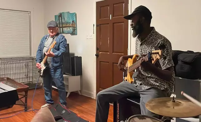 Steve Fowler, left, and Sam Wilson, right, rehearse with their band on Thursday, May 7, 2026, in Memphis, Tenn. (AP Photo/Sophie Bates)
