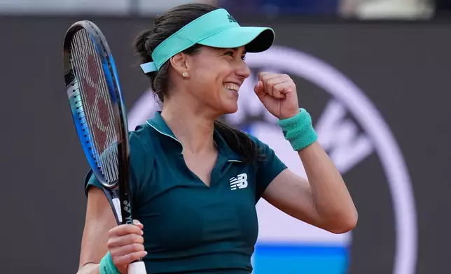 Romania's Sorana Cirstea reacts after winning the match against Belarus' Aryna Sabalenka at the Italian Open tennis tournament in Rome, Saturday, May 9, 2026. (AP Photo/Alessandra Tarantino)