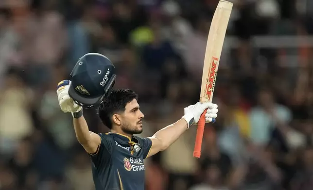 Gujarat Titans' captain Shubman Gill celebrates his century during the Indian Premier League cricket match between Gujarat Titans and Rajasthan Royals in New Chandigarh, India, Friday, May 29, 2026. (AP Photo/Ashwini Bhatia)
