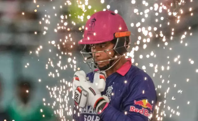Rajasthan Royals' Vaibhav Sooryavanshi walks in to bat during the Indian Premier League cricket match between Gujarat Titans and Rajasthan Royals in New Chandigarh, India, Friday, May 29, 2026. (AP Photo/Ashwini Bhatia)