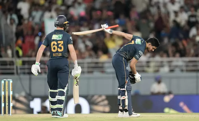 Gujarat Titans' captain Shubman Gill celebrates his century during the Indian Premier League cricket match between Gujarat Titans and Rajasthan Royals in New Chandigarh, India, Friday, May 29, 2026. (AP Photo/Ashwini Bhatia)