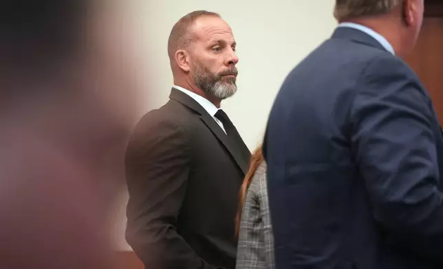 Former sheriff's deputy Jason Meade stands during closing arguments of his retrial on Wednesday, May 6, 2026, inside Franklin County Court of Common Pleas in Columbus, Ohio. (Doral Chenoweth/The Columbus Dispatch via AP, Pool)