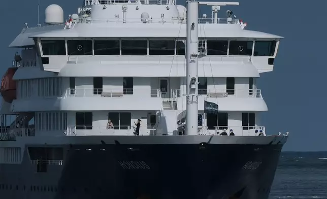 The MV Hondius cruise ship arrives at the Port of Rotterdam, Netherlands, Monday, May 18, 2026. (AP Photo/Patrick Post)