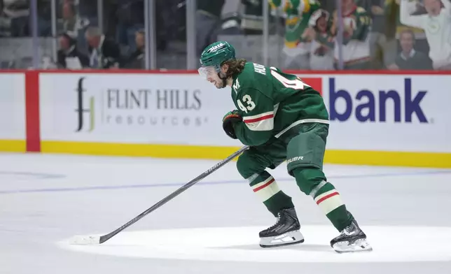 Minnesota Wild defenseman Quinn Hughes (43) skates to the bench after scoring during the third period of Game 6 in the first round of the NHL hockey Stanley Cup playoff series against the Dallas Stars, Thursday, April 30, 2026, in St. Paul, Minn. (AP Photo/Bailey Hillesheim)