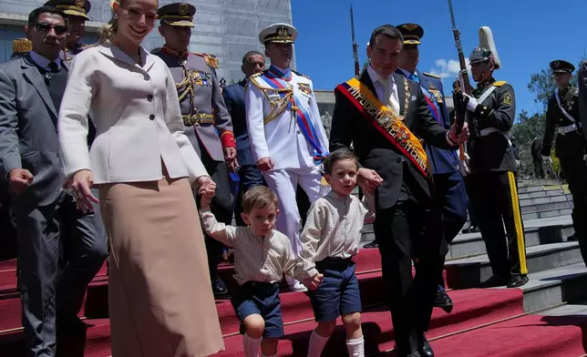 President Daniel Noboa and his family leave the National Assembly after delivering his State of the Nation address at the National Assembly in Quito, Ecuador, Sunday, May 24, 2026. (AP Photo/Dolores Ochoa)