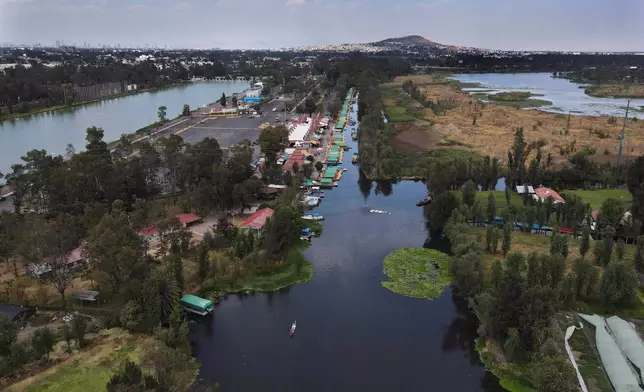 FILE - An aerial view of the Xochimilcol canals in Mexico City, Feb. 16, 2022. (AP Photo/Marco Ugarte, File)