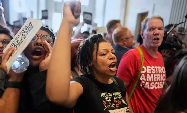 Protesters yell outside the Senate chamber during a special session of the state legislature to redraw U.S. Congressional voting maps, in Nashville, Tenn., Tuesday, May 5, 2026. (AP Photo/George Walker IV)