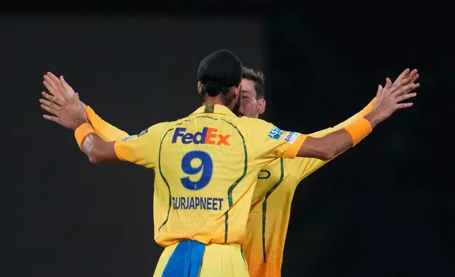 Chennai Super Kings' Noor Ahmad and Gurjapneet Singh celebrate the wicket of Delhi Capitals' Karun Nair during the Indian Premier League cricket match between Chennai Super Kings and Delhi Capitals in New Delhi, India, Tuesday, May 5, 2026. (AP Photo/Manish Swarup)