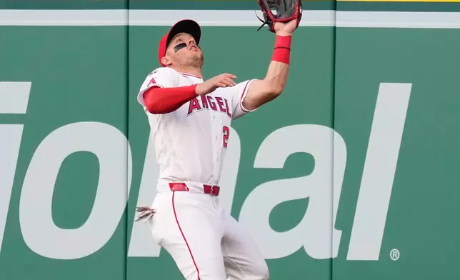 Los Angeles Angels center fielder Mike Trout makes a catch on a ball hit by New York Mets' Mark Vientos during the second inning of a baseball game Saturday, May 2, 2026, in Anaheim, Calif. (AP Photo/Mark J. Terrill)