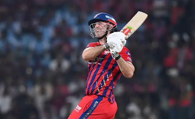 Lucknow Super Giants' Mitchell Marsh plays a shot during the Indian Premier League cricket match between Royal Challengers Bengaluru and Lucknow Super Giants in Lucknow, India, Thursday, May 7, 2026. (AP Photo)