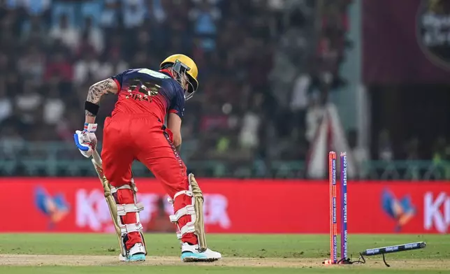 Royal Challengers Bengaluru's Virat Kohli is bowled out by Lucknow Super Giants' Prince Yadav during the Indian Premier League cricket match between Royal Challengers Bengaluru and Lucknow Super Giants in Lucknow, India, Thursday, May 7, 2026. (AP Photo)