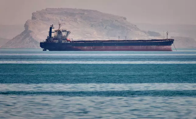 A bulk cargo ship sits at anchor in the Strait of Hormuz off Bandar Abbas, Iran, Saturday, May 2, 2026.(Amirhosein Khorgooi/ISNA via AP)