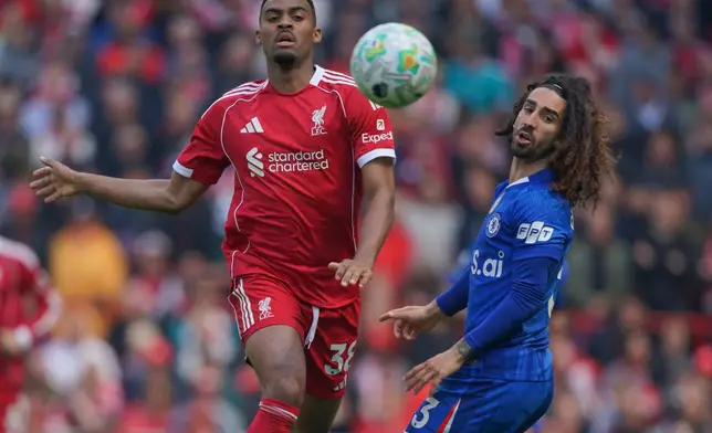Liverpool's Ryan Gravenberch, left, and Chelsea's Marc Cucurella go for the ball during the Premier League soccer match between Liverpool and Chelsea in Liverpool, England, Saturday, May 9, 2026. (AP Photo/Ian Hodgson)