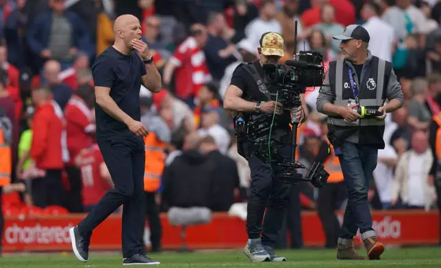 Liverpool's manager Arne Slot walks off the pitch after the Premier League soccer match between Liverpool and Chelsea in Liverpool, England, Saturday, May 9, 2026. (AP Photo/Ian Hodgson)