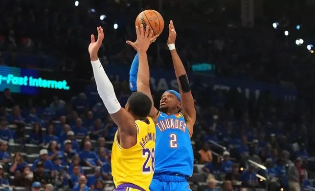 Oklahoma City Thunder guard Shai Gilgeous-Alexander (2) shoots over Los Angeles Lakers forward Rui Hachimura (28) in the second half of Game 1 in a second-round NBA basketball playoffs series Tuesday, May 5, 2026 in Oklahoma City. (AP Photo/Kyle Phillips)