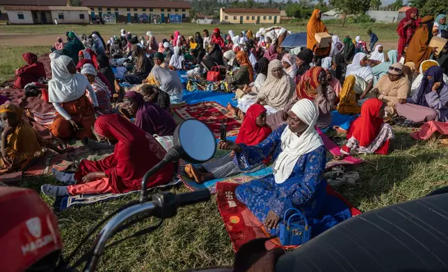 Muslims gather to pray at Sayo Muhamed School during the Eid al-Adha celebration amid an Ebola outbreak in Bunia, Congo, Wednesday, May 27, 2026. (AP Photo/Moses Sawasawa)