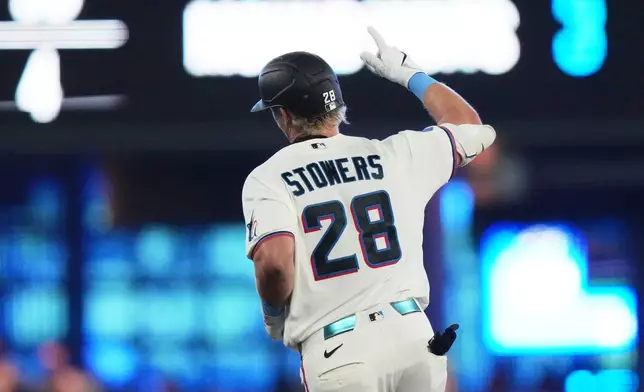Miami Marlins' Kyle Stowers (28) runs the bases after hitting a two run home run during the fourth inning of a baseball game against the Washington Nationals, Saturday, May 9, 2026, in Miami. (AP Photo/Lynne Sladky)