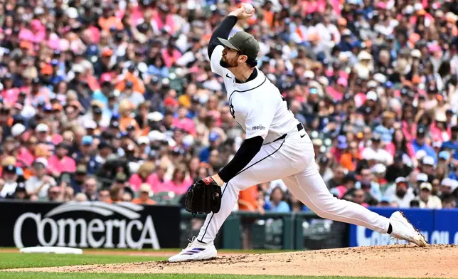 Detroit Tigers starting pitcher Casey Mize throws during the third inning of a baseball game against the Toronto Blue Jays, Saturday, May 16, 2026, in Detroit. (AP Photo/Jose Juarez)