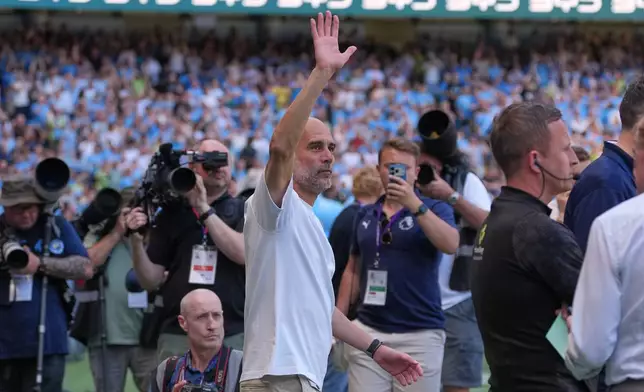 Manchester City's head coach Pep Guardiola waves ahead of his last match as a manager before a Premier League soccer match between Manchester City and Aston Villa in Manchester, England, Sunday, May 24, 2026. (AP Photo/Alastair Grant)