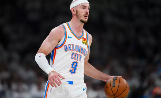 Oklahoma City Thunder guard Alex Caruso (9) moves down court against the San Antonio Spurs in the first half of Game 5 in the Western Conference finals NBA basketball playoffs series, Tuesday, May 26, 2026, in Oklahoma City. (AP Photo/Julio Cortez)