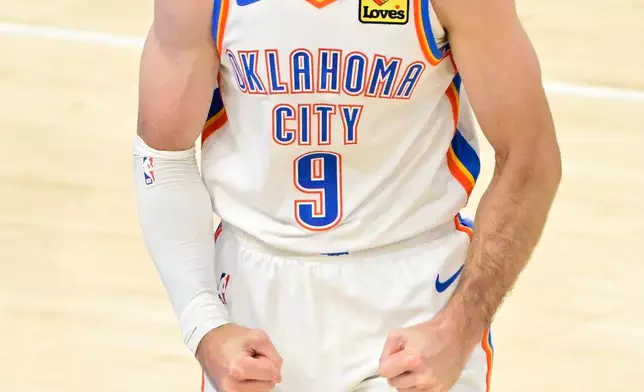Oklahoma City Thunder guard Alex Caruso (9) reacts to play against the San Antonio Spurs in the first half of Game 5 in the Western Conference finals NBA basketball playoffs series, Tuesday, May 26, 2026, in Oklahoma City. (AP Photo/Gerald Leong)