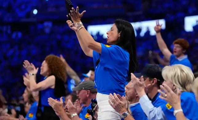 Fans cheer during the second half of Game 1 in a third-round NBA basketball playoffs series between the San Antonio Spurs and the Oklahoma City Thunder Monday, May 18, 2026, in Oklahoma City. (AP Photo/Tony Gutierrez)