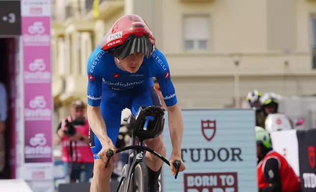 Denmark's Jonas Vingegaard pedals during the 10th stage of the Giro d'Italia cycling race from Viareggio to Massa, Italy, Tuesday May 19, 2026. (Massimo Paolone/LaPresse via AP)
