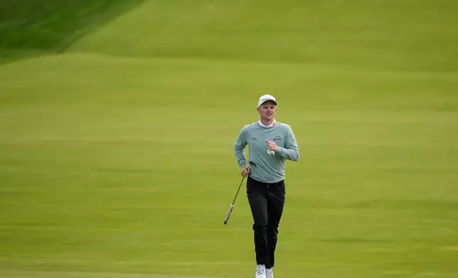 Justin Rose, of England, runs up the 10th fairway during the second round of the PGA Championship golf tournament at Aronimink Golf Club, Friday, May 15, 2026, in Newtown Square, PA. (AP Photo/Matt Slocum)