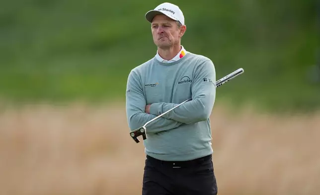 Justin Rose, of England, watches from the 10th green during the second round of the PGA Championship golf tournament at Aronimink Golf Club, Friday, May 15, 2026, in Newtown Square, PA. (AP Photo/Matt Slocum)