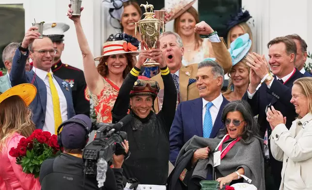 Jockey Jose L. Ortiz celebrates after riding Golden Tempo to victory the 152nd running of the Kentucky Derby horse race at Churchill Downs, Saturday, May 2, 2026, in Louisville, Ky. (AP Photo/Abbie Parr)
