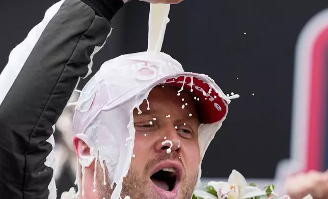 Felix Rosenqvist, of Sweden, celebrates after winning the Indianapolis 500 auto race at Indianapolis Motor Speedway in Indianapolis, Sunday, May 24, 2026. (AP Photo/Michael Conroy)