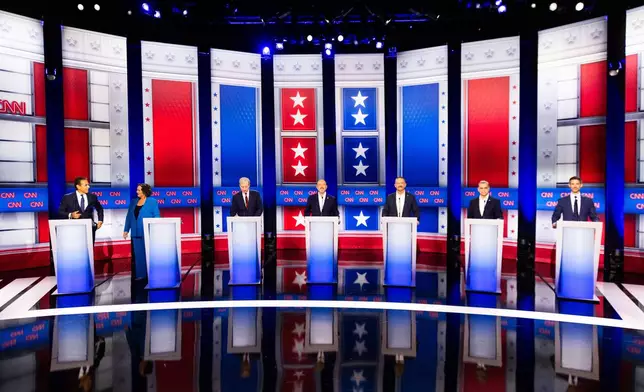 From left to right, Antonio Villaraigosa, Katie Porter, Tom Steyer, Steve Hilton, Chad Bianco, Xavier Becerra and Matt Mahan participate in a California gubernatorial debate hosted by CNN at East Los Angeles College in Monterey Park, Calif. Tuesday, May 5, 2026. (AP Photo/Ethan Swope)