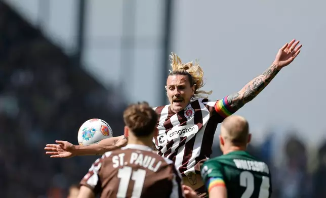 St. Pauli's Jackson Irvine in action during the German Bundesliga soccer match between FC St. Pauli and VfL Wolfsburg in Hamburg, Germany, Saturday, May 16, 2026. (Christian Charisius/dpa via AP)