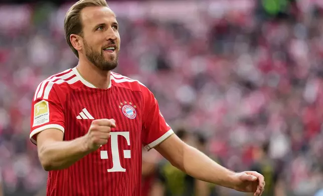 Bayern's Harry Kane celebrates after scoring during a Bundesliga soccer match between Bayern and FC Cologne in Munich, Germany, Saturday, May 16, 2026. (AP Photo/Matthias Schrader)