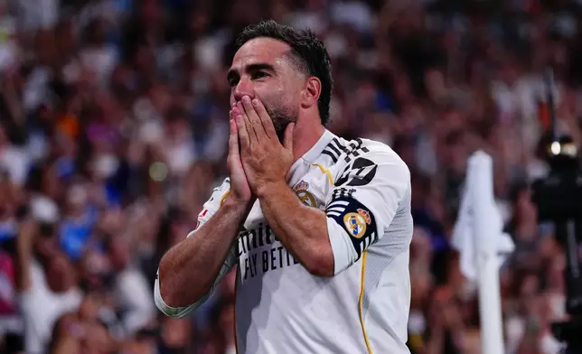 Real Madrid's Dani Carvajal celebrates after a goal during a La Liga soccer match between Real Madrid and Athletic in Madrid, Spain, Saturday, May 23, 2026. (AP Photo/Manu Fernandez)