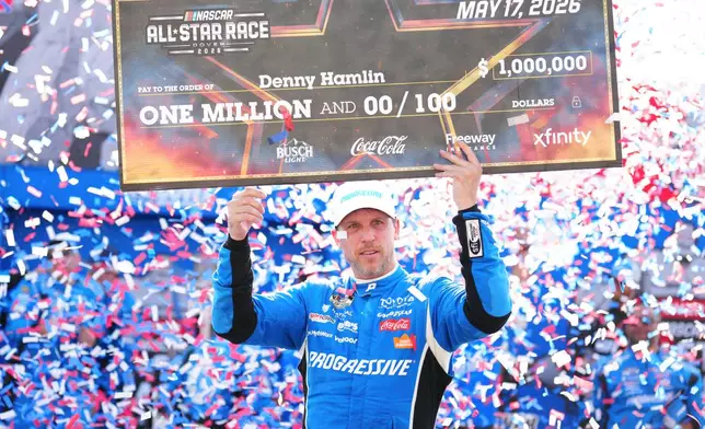 Denny Hamlin celebrates in Victory Lane after winning the NASCAR All-Star auto race at Dover Motor Speedway, Sunday, May 17, 2026, in Dover, Del. (AP Photo/Derik Hamilton)