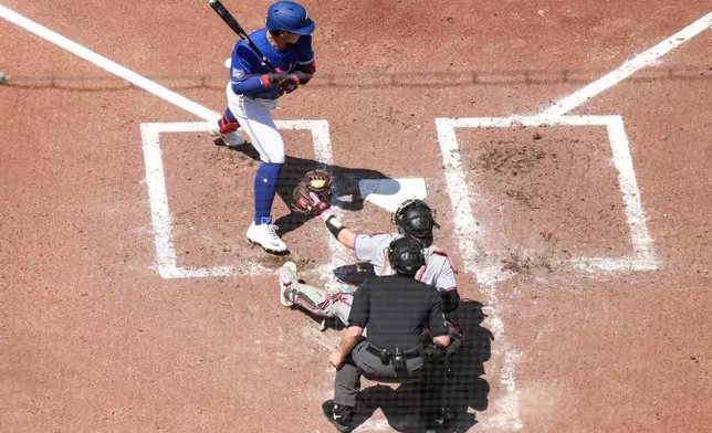 Toronto Blue Jays' Kazuma Okamoto (7) is hit by a pitch from Miami Marlins' Eury Pérez during the fourth inning of a baseball game in Toronto, Wednesday, May 27, 2026. (Chris Young/The Canadian Press via AP)