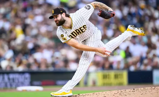 San Diego Padres pitcher Lucas Giolito delivers during the second inning of a baseball game against the Athletics, Saturday, May 23, 2026, in San Diego. (AP Photo/William Liang)