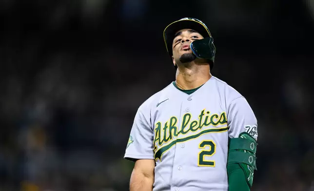 Athletics' Darell Hernaiz reacts after hitting a flyout during the seventh inning of a baseball game against the San Diego Padres, Saturday, May 23, 2026, in San Diego. (AP Photo/William Liang)