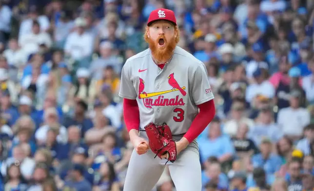 St. Louis Cardinals pitcher Dustin May reacts to a strikeout during the seventh inning of a baseball game against the Milwaukee Brewers Wednesday, May 27, 2026, in Milwaukee. (AP Photo/Kayla Wolf)