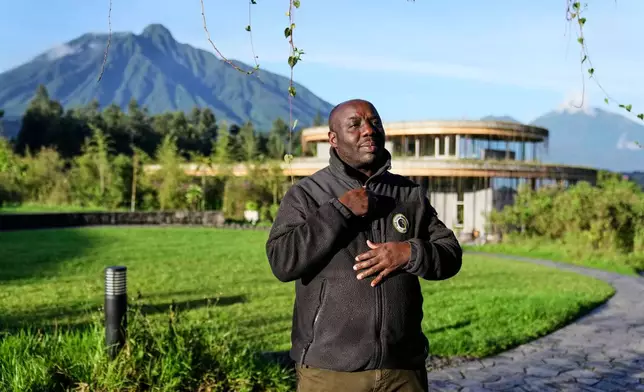 Deogratias Tuyisingize, a biodiversity researcher with the Dian Fossey Gorilla Fund, speaks during an interview in Volcanoes National Park, Kinigi, Rwanda, Thursday, March 19, 2026. (AP Photo/Brian Inganga)