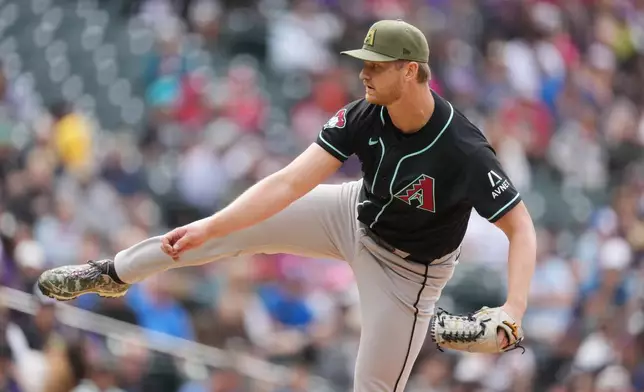Arizona Diamondbacks starting pitcher Michael Soroka works against the Colorado Rockies in the first inning of a baseball game, Sunday, May 17, 2026, in Denver. (AP Photo/David Zalubowski)