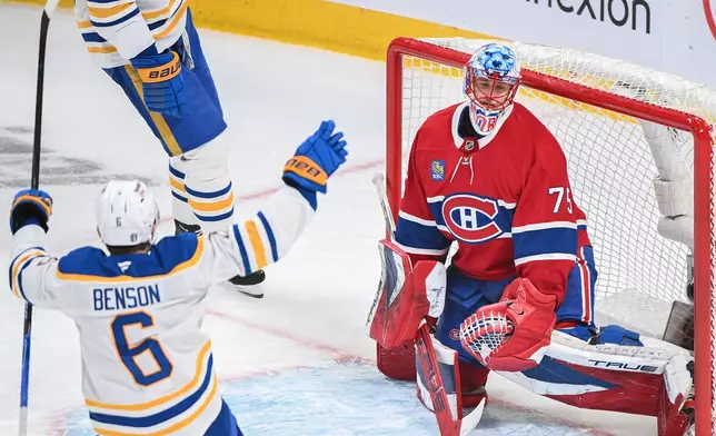 Buffalo Sabres' Zach Benson (6) reacts to a goal by teammate Tage Thompson against Montreal Canadiens goaltender Jakub Dobes (75) during second period, second round, game 4, NHL playoff hockey game in Montreal on Tuesday, May 12, 2026. (Graham Hughes/The Canadian Press via AP)