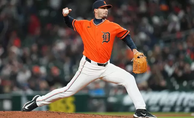 Detroit Tigers pitcher Burch Smith throws against the Texas Rangers during the ninth inning of a baseball game Friday, May 1, 2026, in Detroit. (AP Photo/Paul Sancya)