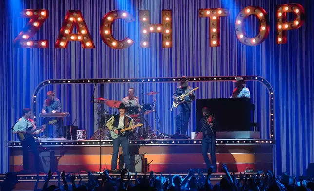 Zach Top performs "Honky Tonk Till it Hurts" during the 61st annual Academy of Country Music Awards on Sunday, May 17, 2026, at the MGM Grand Garden Arena in Las Vegas. (AP Photo/Chris Pizzello)