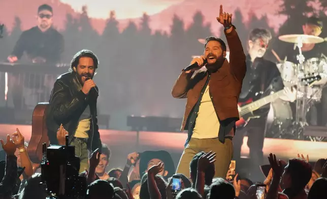 Thomas Rhett, left, and Jordan Davis perform "Ain't a Bad Life" during the 61st annual Academy of Country Music Awards on Sunday, May 17, 2026, at the MGM Grand Garden Arena in Las Vegas. (AP Photo/Chris Pizzello)